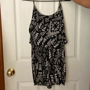 Patterned romper with spaghetti straps.